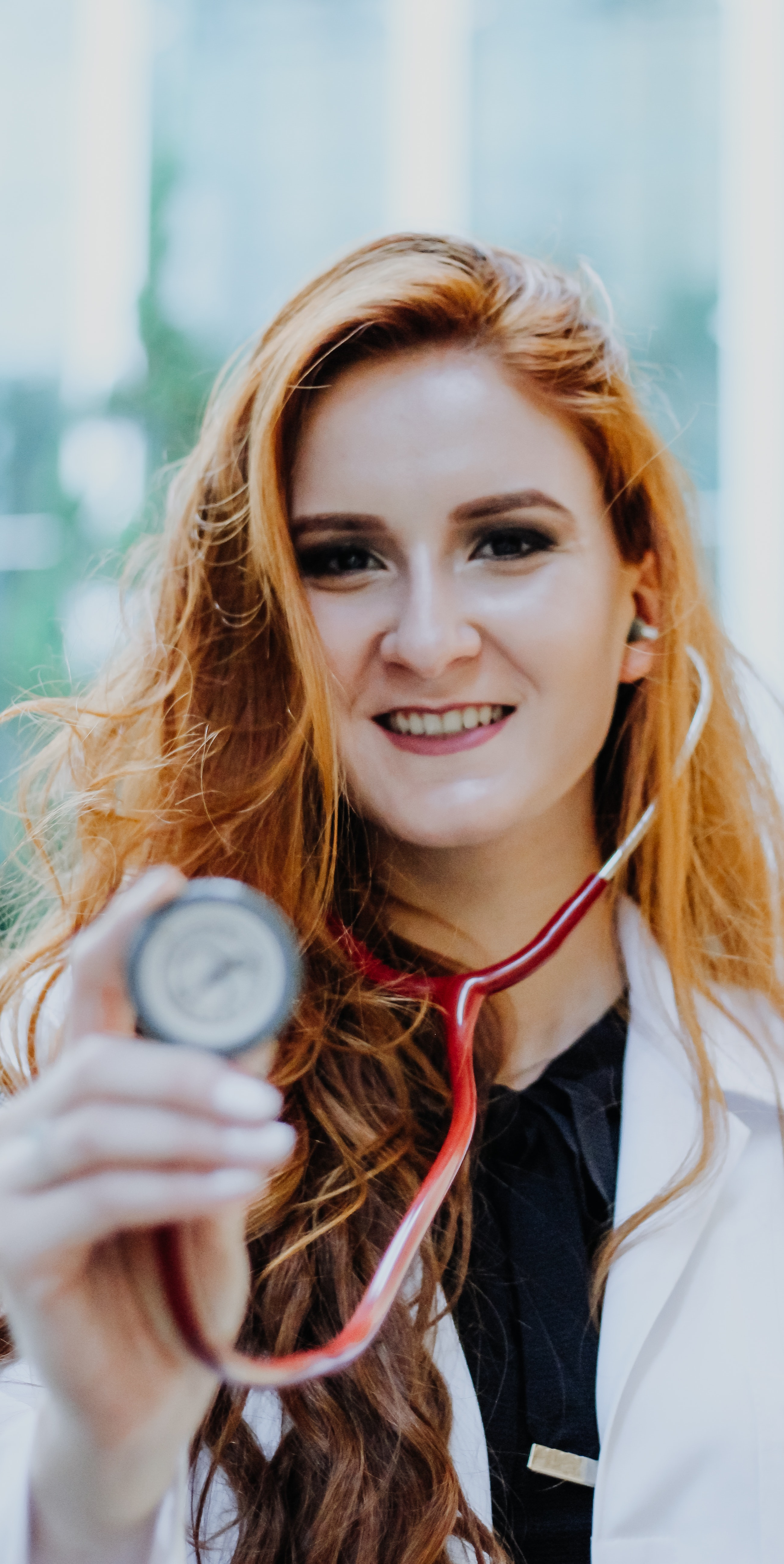 Nurse holding stethoscope